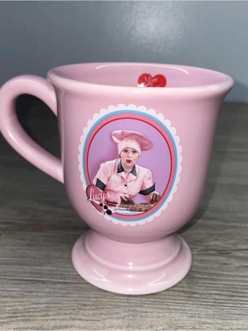 I Love Lucy, “Hey This Is Fun” Chocolate Factory Pink Pedestal Coffee Mug.